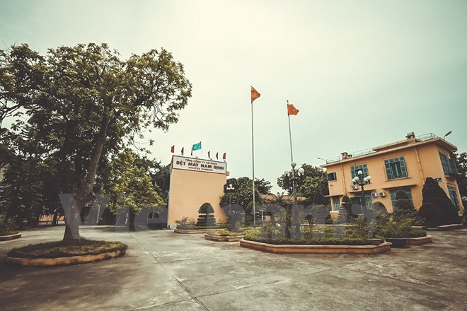 Nhà máy Dệt Nam Định tiền thân là một cơ sở nghiên cứu về tơ lụa do Toàn quyền Đông Dương - De Lanessan sáng lập. (Ảnh: Minh Sơn/Vietnam+) 
