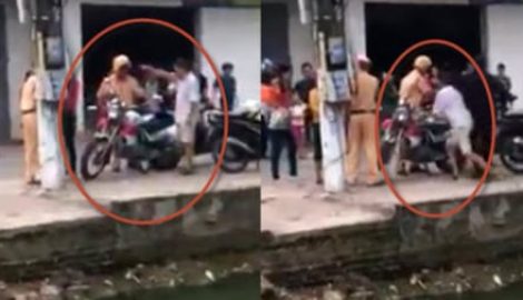 Bị thổi phạt, cụ ông xô ngã và chém xe CSGT Nam Định